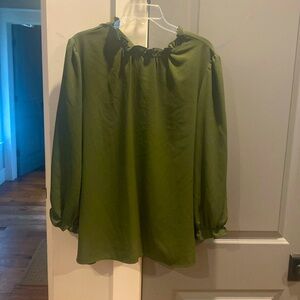 Cute green top.  Great for fall!  Cute ruffle detail on wrist and neck.  Size L.